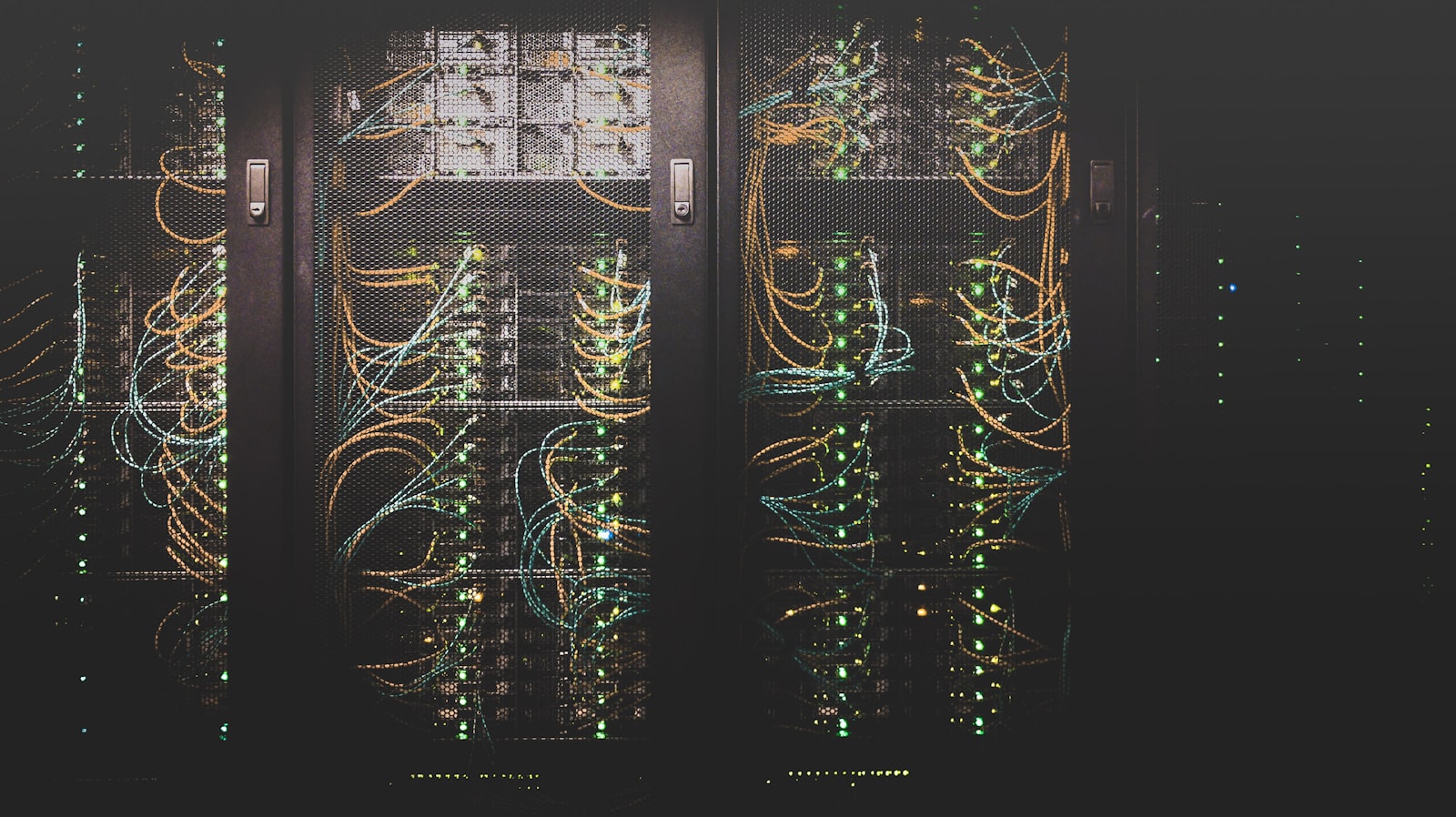 Data center server racks with structured cabling and status lights